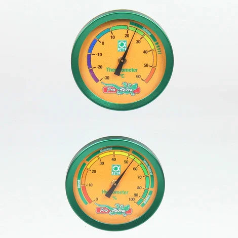 Thermomètre et hygromètre pour aquarium avec cadrans ronds, fond orange et bords verts.